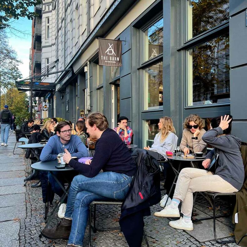 Enjoy your coffee while talking to friends at The Barn Roastery