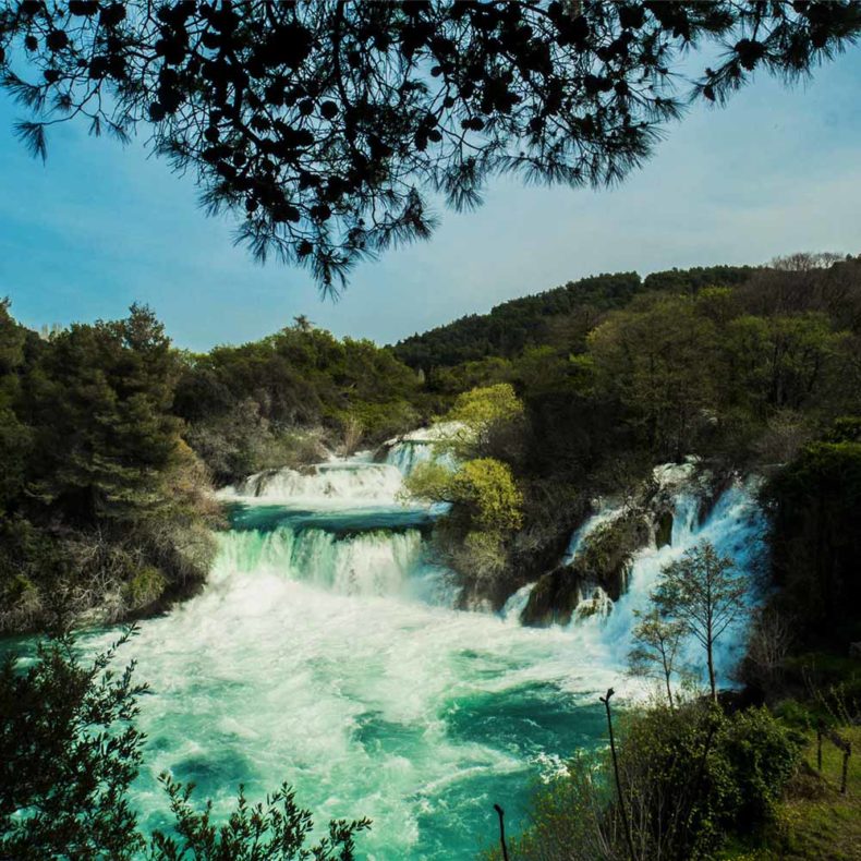 Swim in a waterfall in Krke in Croatia
