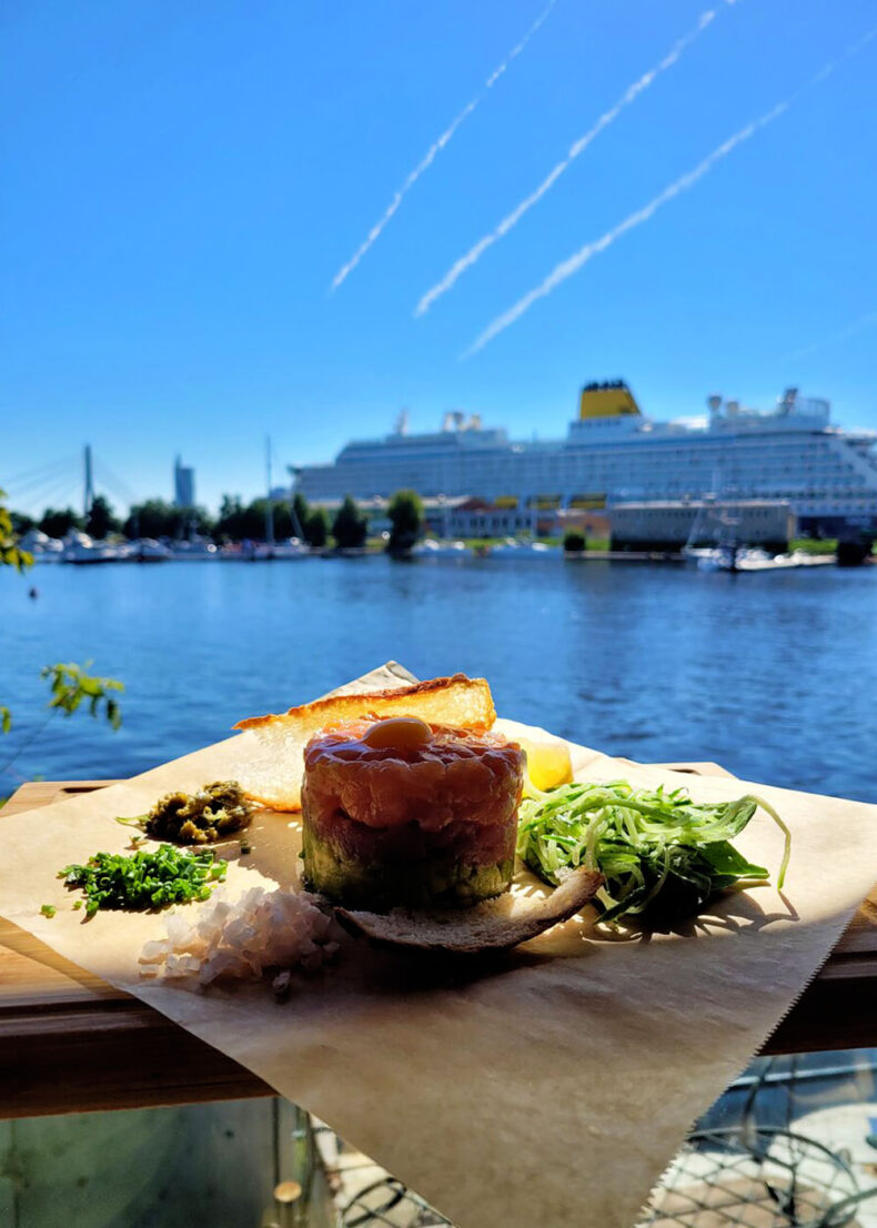 Enjoy your food practically on the water in the restaurant Naples in Riga, Andrejosta