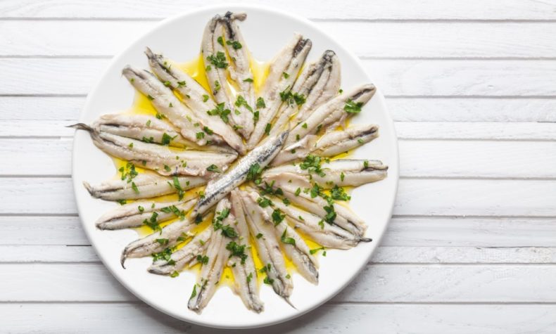 Boquerones is a legendary Spain dish – salty anchovies marinated in vinegar
