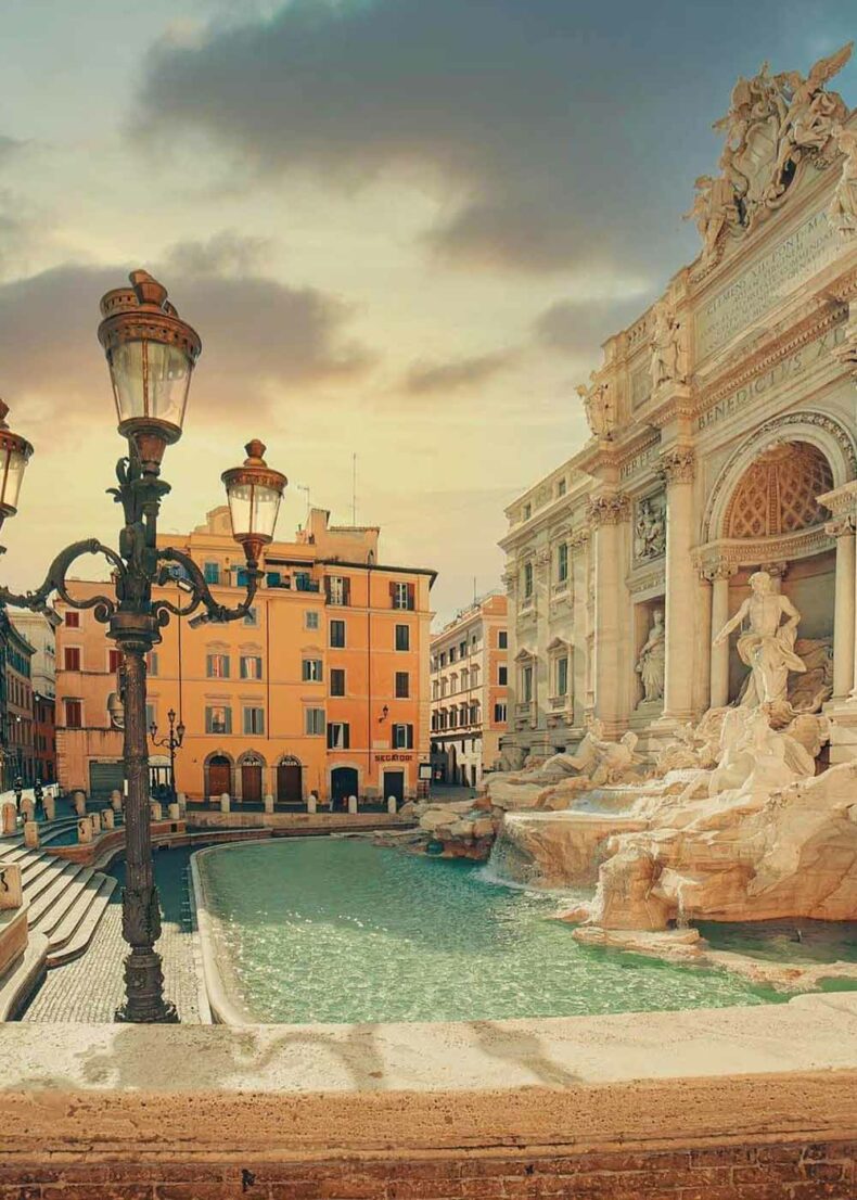 Visit the famous Trevi Fountain early in the morning