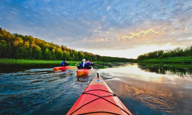 Canoeing down the Dubna River in Latgale