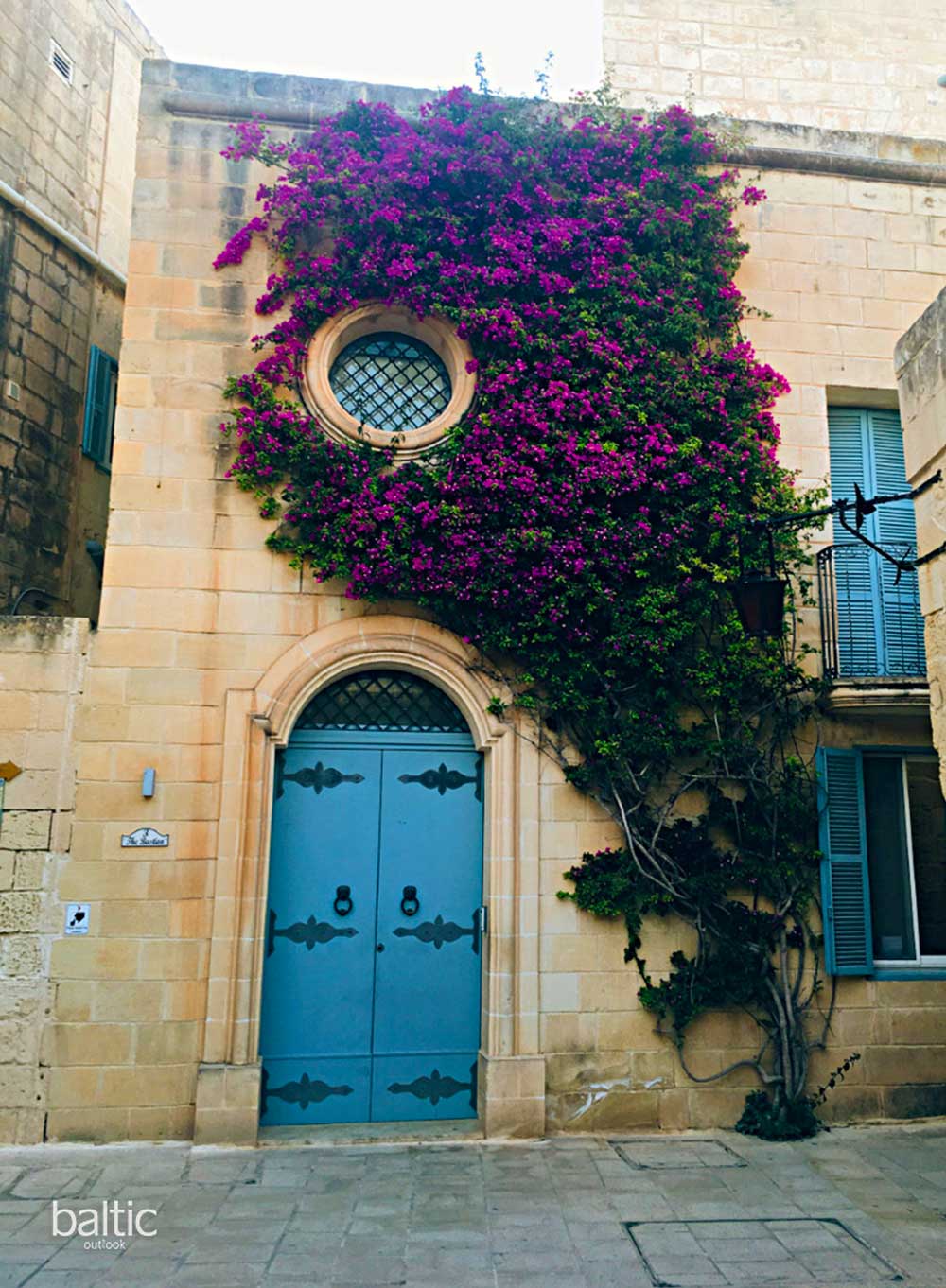 House with flower in Valletta that is one of the most concentrated historical areas in the world_