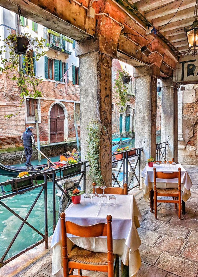 Have a meal in the canalside places in Venice