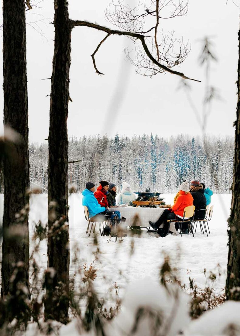 Group of people having lunch outside during wintertime
