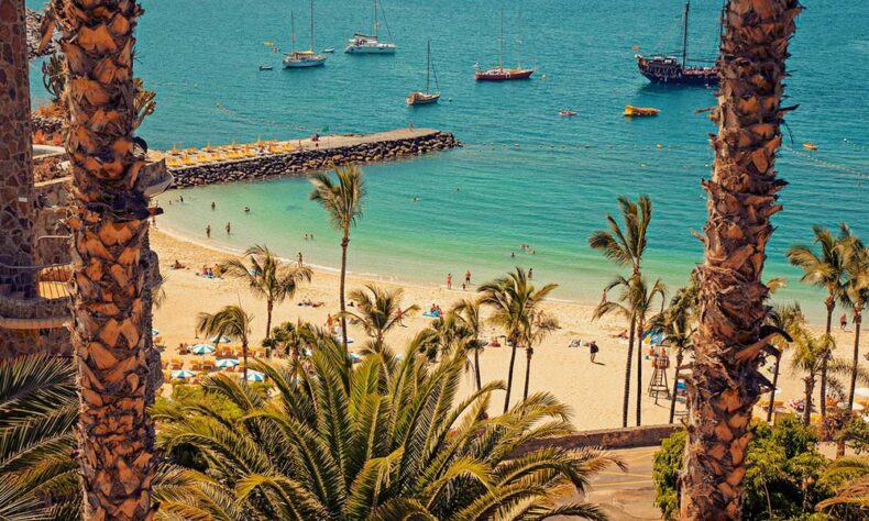 Spend day sunbathing on the beach in Gran Canaria