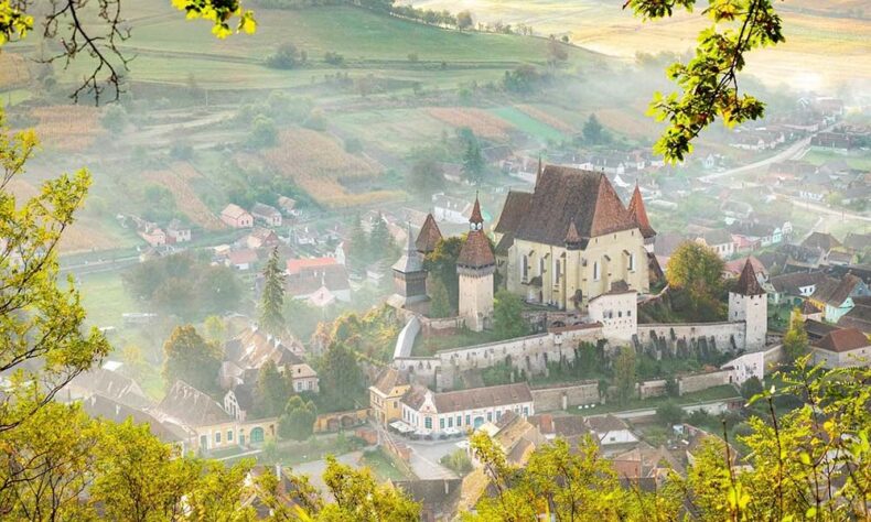 Travel around beautiful Transylvania villages that are included in UNESCO