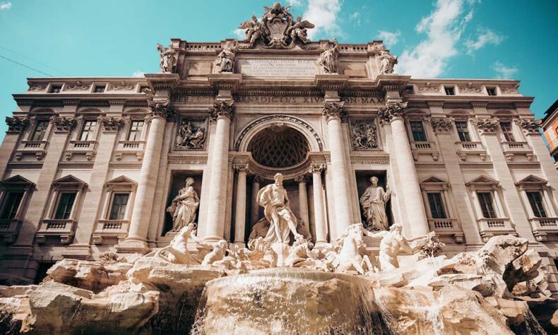 Flip a coin into the Trevi Fountain – for that return visit