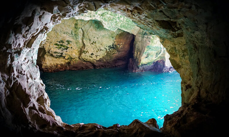 Listen to the sound of the waves amplified by the cave tunnel in the Rosh HaNikra grottoes