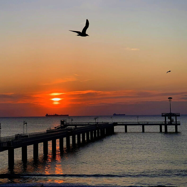 The central beach pier is the ultimate spot for watching sunsets