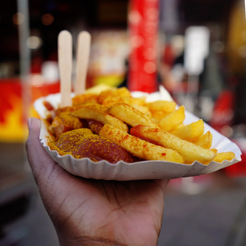 Currywurst sausage with fries is one of the traditional dishes in Germany