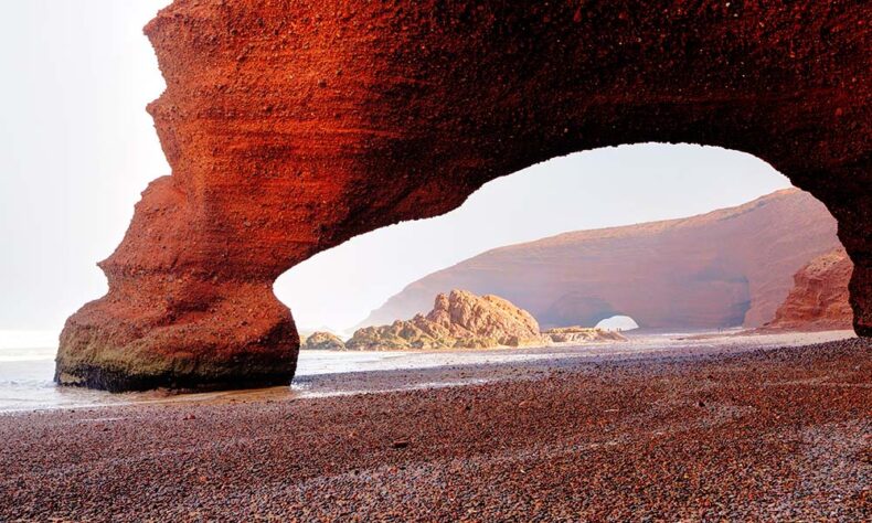 Natural stone arch at Legzira beach in Morocco