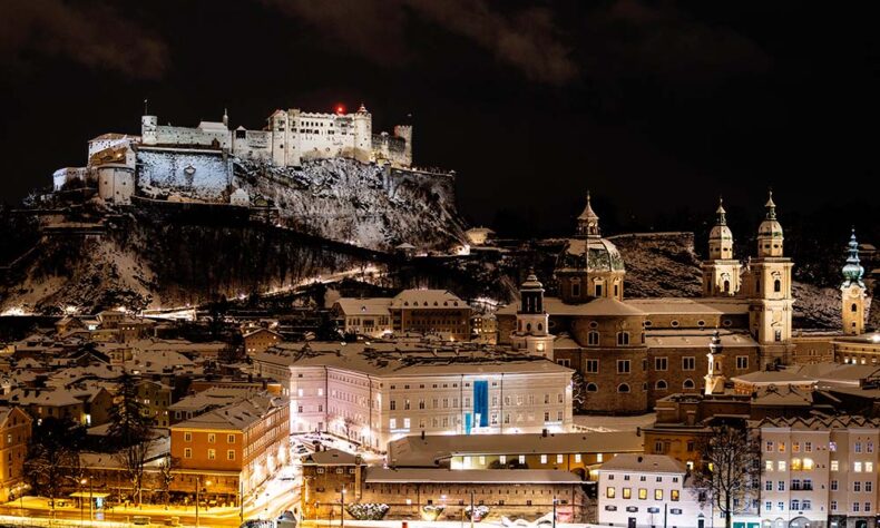 A view of Salzburg's Old Town and the Hohensalzburg Fortress at night
