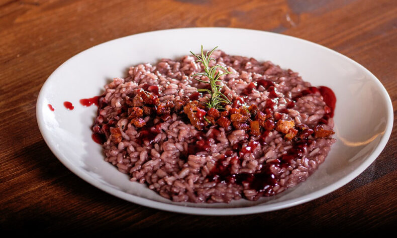 Try traditional Verona dish such as risotto all'Amarone - risotto cooked with Amarone wine