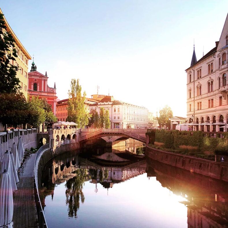 A lively riverside in summer by the Ljubljanica River