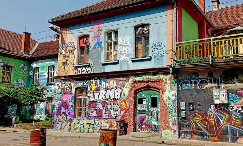During the daytime, go to Metelkova Mesto to admire the wonderful graffiti