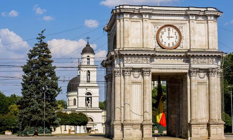 The impressive Chisinau Triumphal Arch with Nativity Cathedral behind