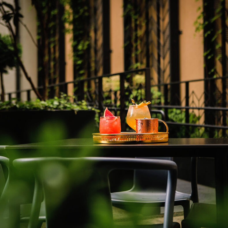 During the sunny season, enjoy your cocktail at the Snob bar relaxing courtyard
