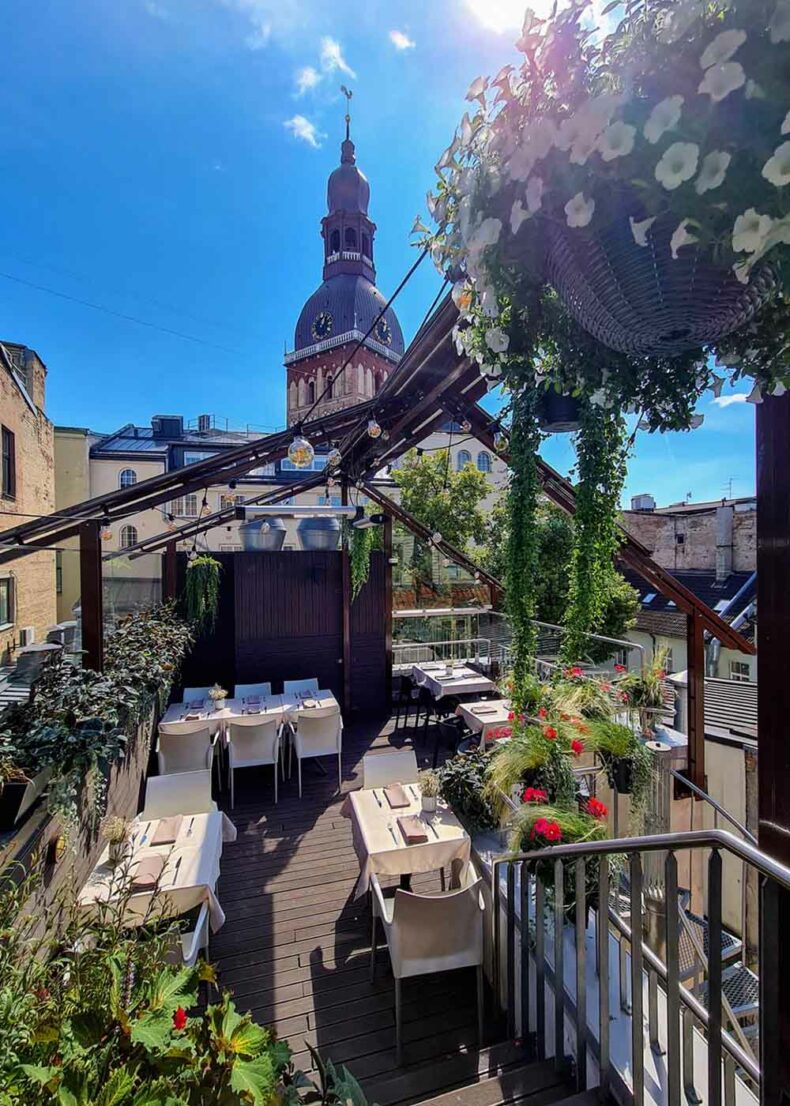 Le Dome restaurant rooftop terrace with breathtaking views of the enchanting rooftops of the Old Town