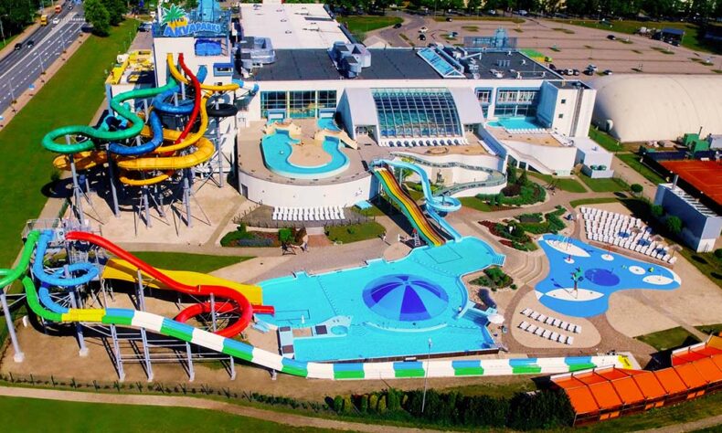 Līvu akvaparks offers thrilling slides, family-friendly areas, a luxurious spa, and an outdoor beach