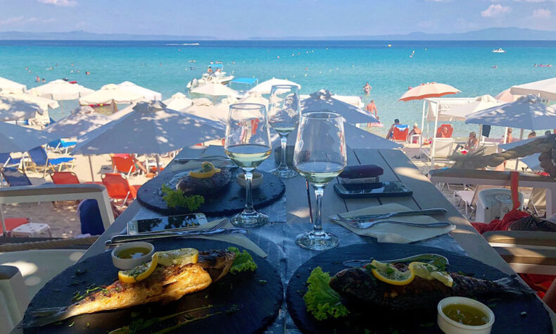 Dine with a beautiful view from the beach restaurant in Kalithea