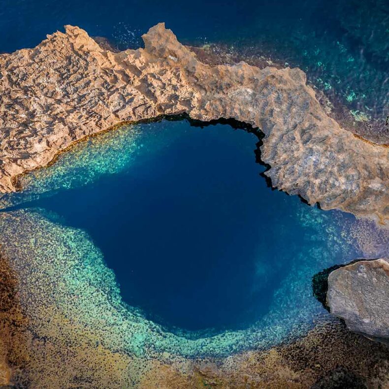The Blue Hole, which is situated next to the famous collapsed Azure Window in Dwejra