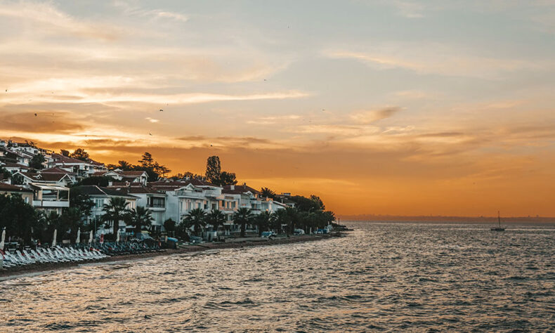 A sunset view over white houses on the Princes’ Islands