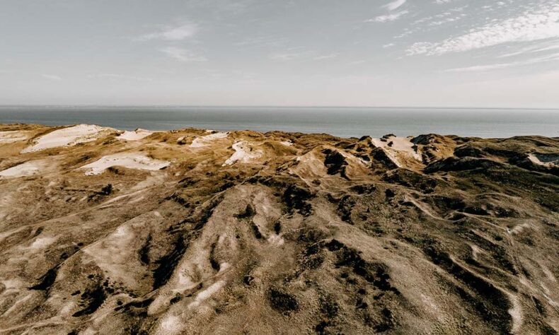 At the Nagliai Nature Reserve, you will see white dunes reminiscent of desert landscapes