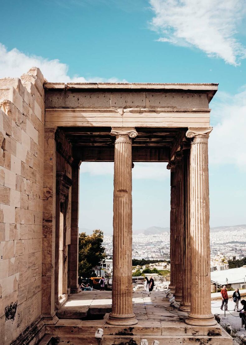 Columns of the Acropolis temple and view over the city