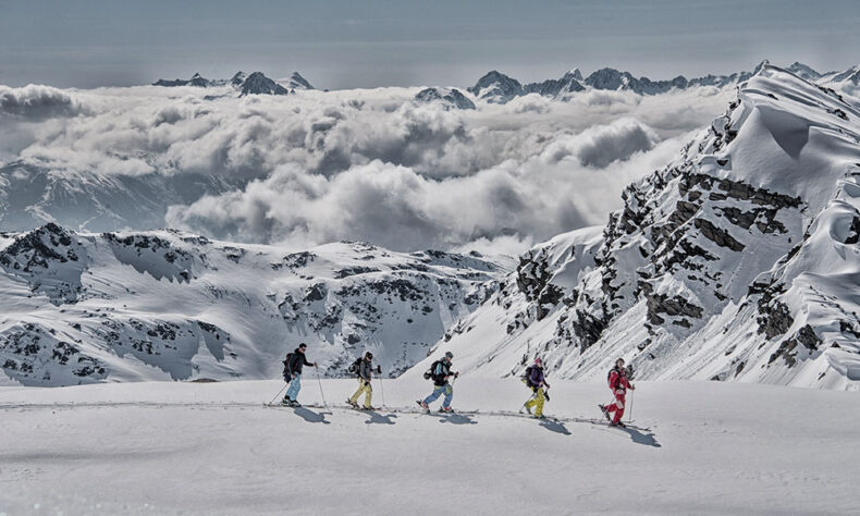 Group of people going on ski freeride at the Val Thorens ski region