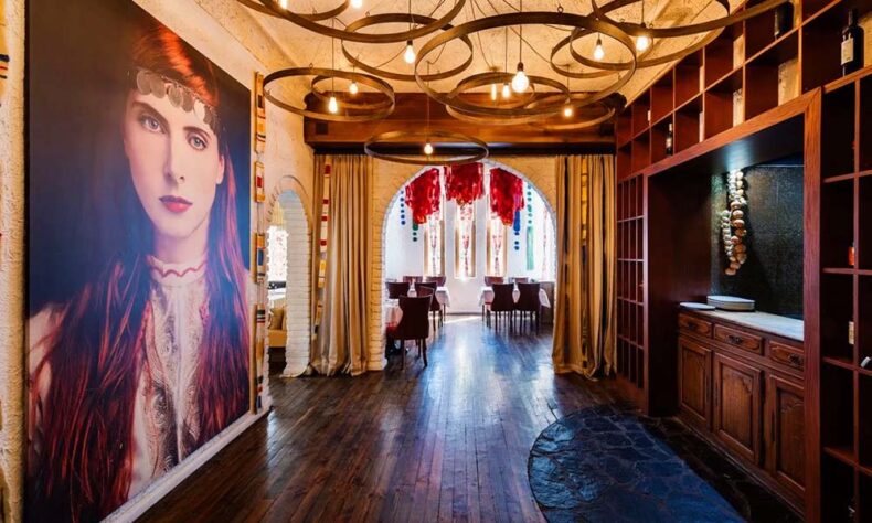 Sofia's restaurant Moma dining rooms have their design, some decorated with portraits of women in traditional dress