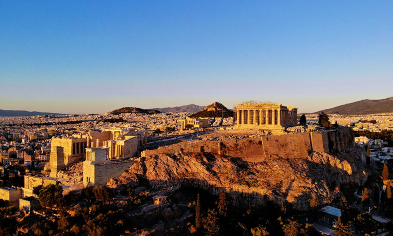 The Acropolis of Athens occupies a tall rocky hill and overlooks the city