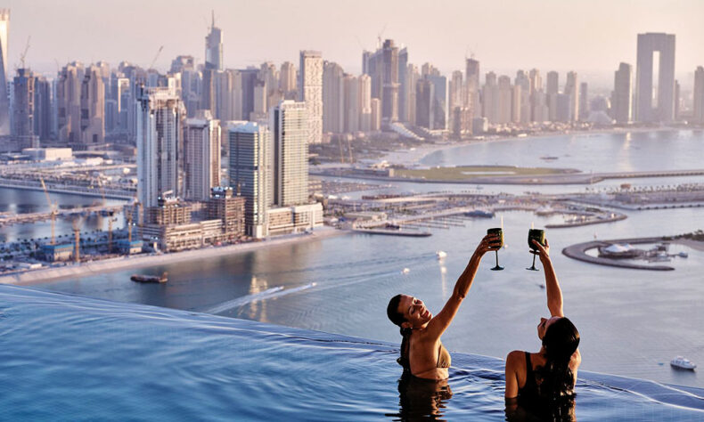 Women having a drink at the Aura Sky Pool club