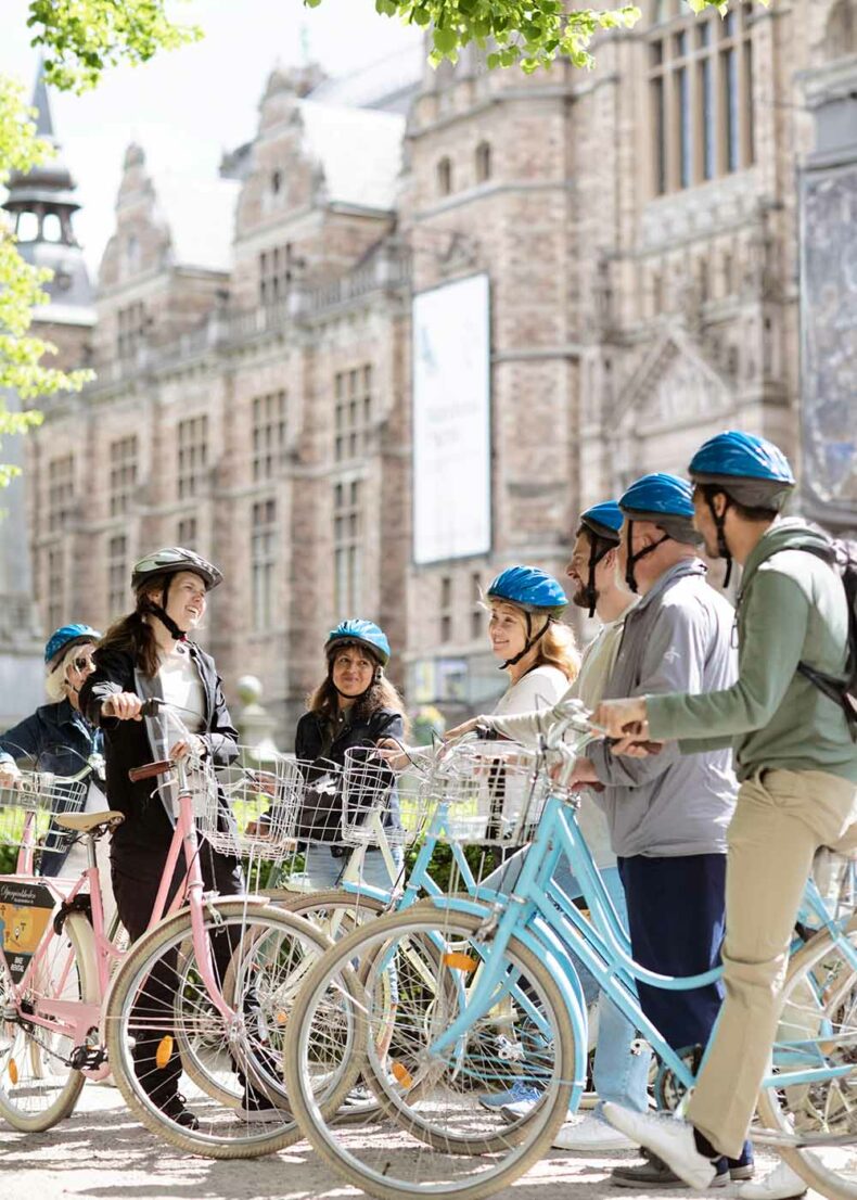 Group of people explore Stockholm city by guided bicycle tours