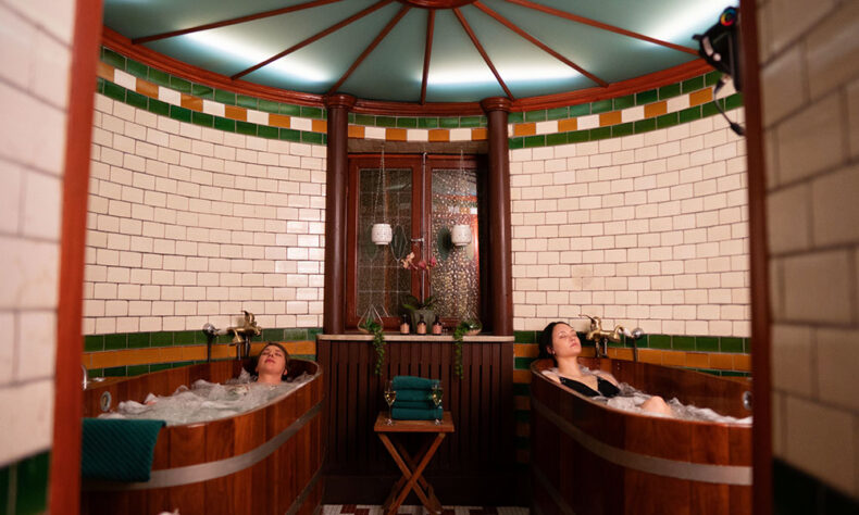 Spa baths in classic wooden tubs at the Centralbadet, an Art Nouveau-inspired urban spa in Stockholm