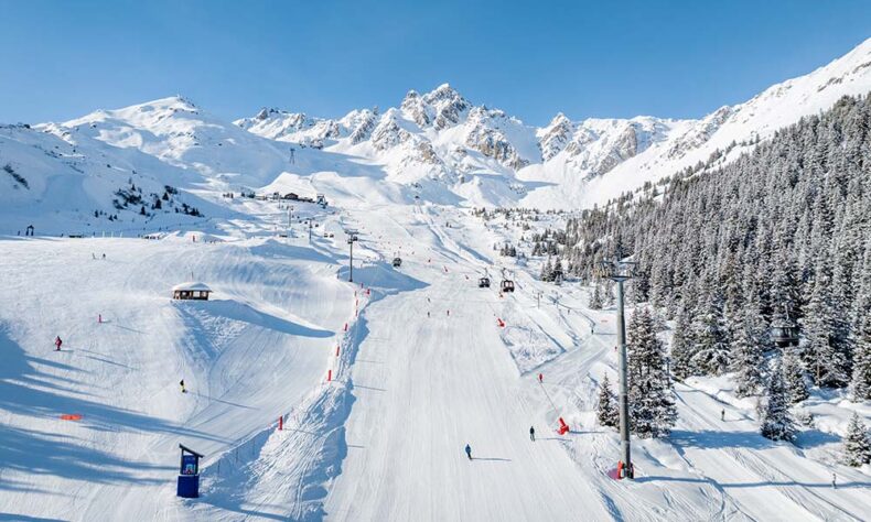 Le Praz at Courchevel is the lowest and is dominated by the towering ski jump