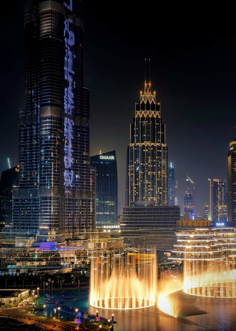The Dubai Fountain at the foot of the Burj Khalifa during nighttime