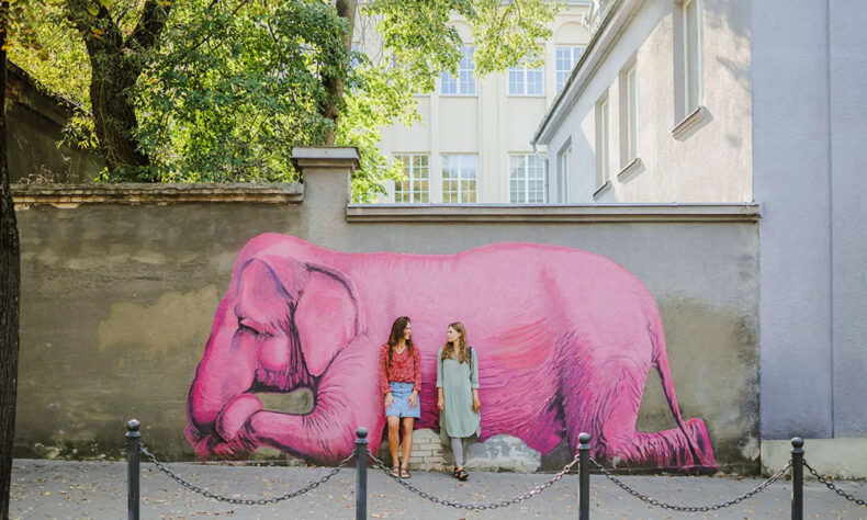 The charming pink elephant mural - a symbol of love and a popular Instagrammable spot in Kaunas