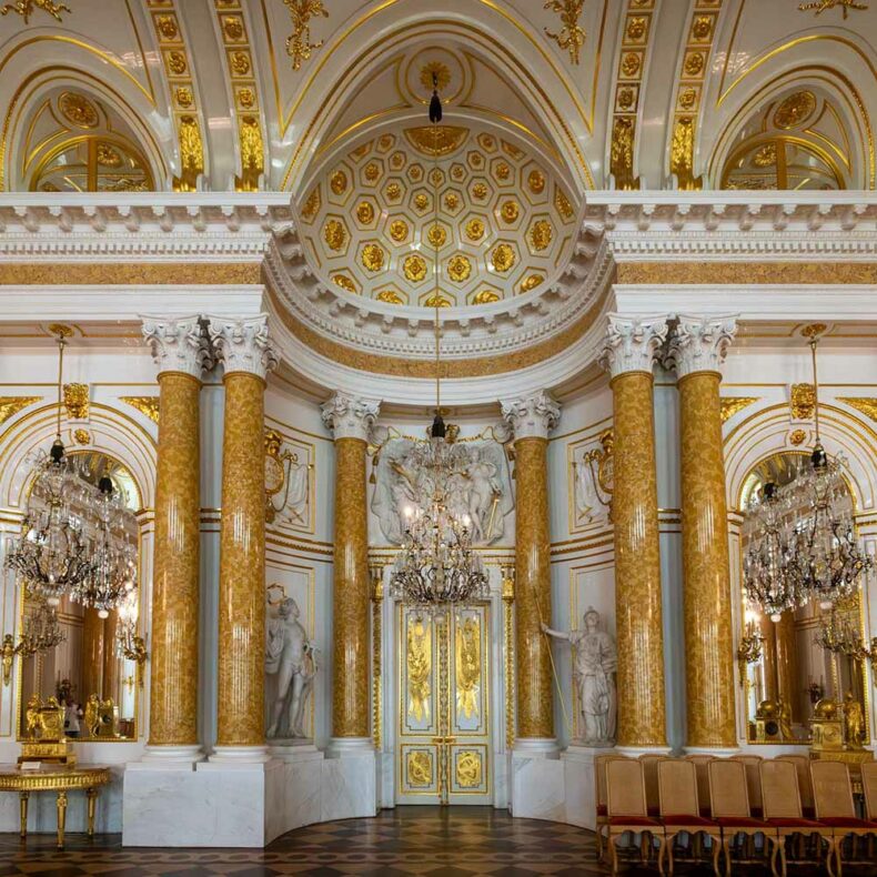 This castle room with a chandelier is a part of the Royal Castle in Warsaw which is a national historical monument