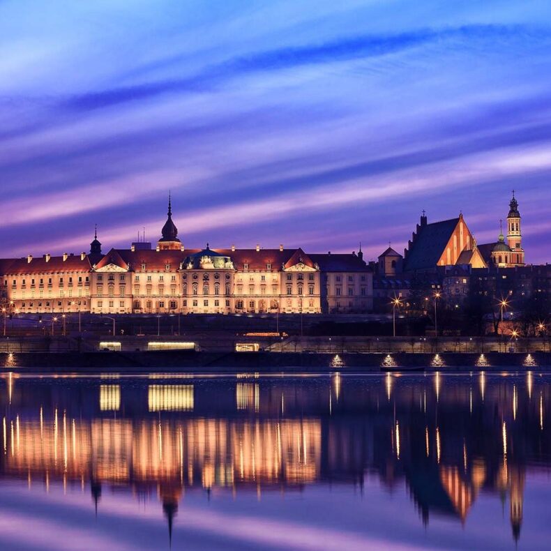 Warsaw Royal castle lit up during night time