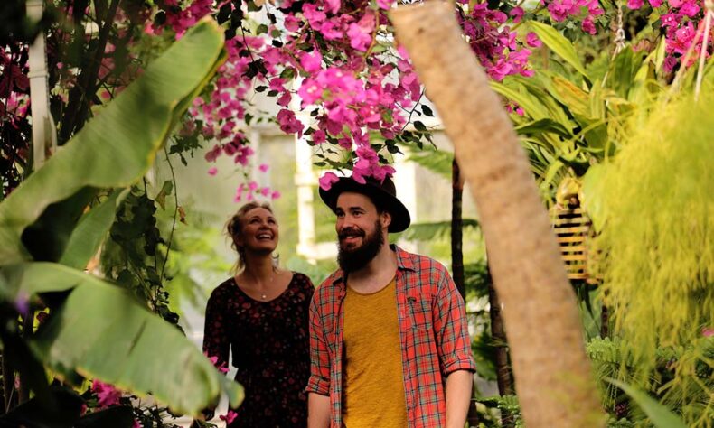 A couple exploring the Oulu University Botanical Garden, one of the top Oulu attractions for nature lovers