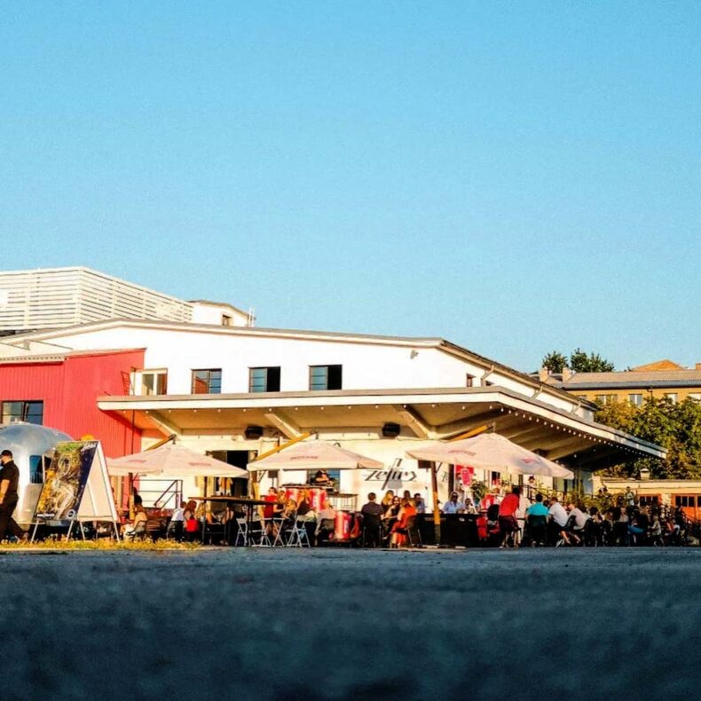 People enjoying evening at Zefīrs which is a part of the Sporta 2 Quarter