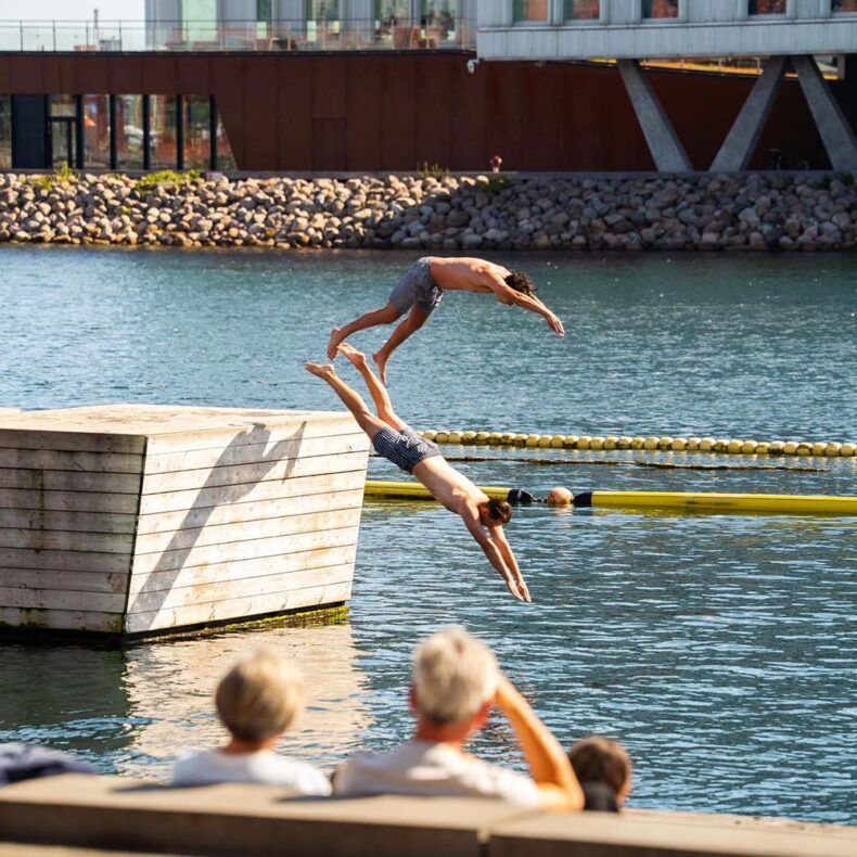 People swimming in the harbour and enjoying summer in Copenhagen