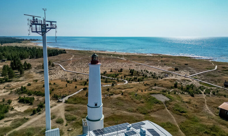View of the iconic Hailuoto Island white lighthouse and the beach