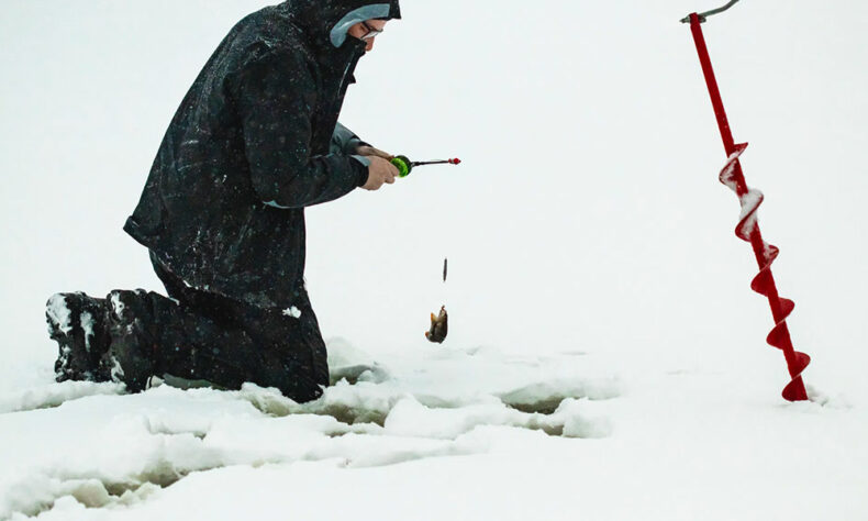 Kuusamo offers ice fishing before cooking your catch over an open fire