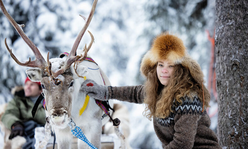 While in Kuusamo join local herders for a traditional reindeer sleigh ride