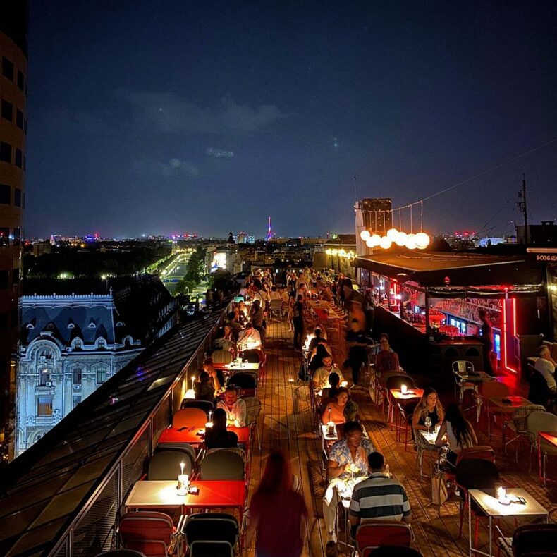 Linea Closer to the Moon rooftop restaurant and bar with a view of the city at night