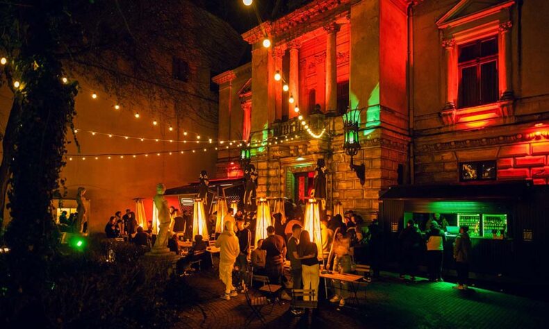 People enjoying time at the Grădina Monteoru which is one of the Bucharest’s garden bars